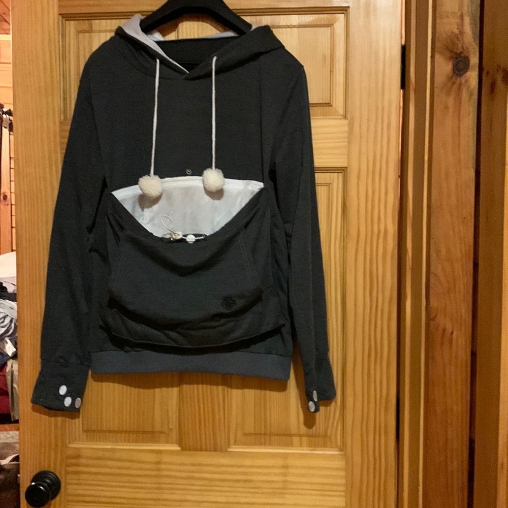Very unique hoody made for holding a dog in the front.